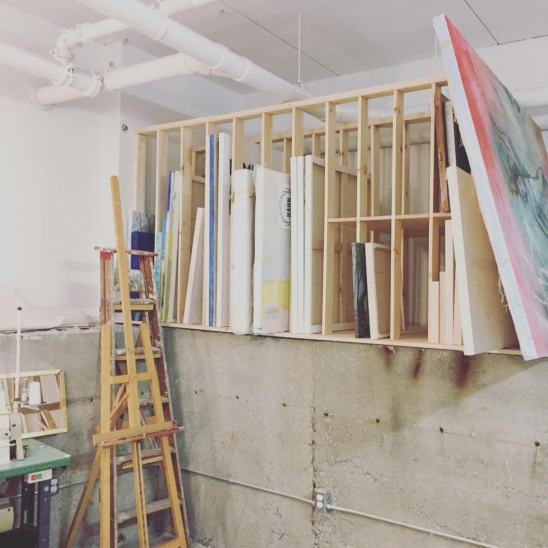 Art studio stand up storage for large canvases photo by Instagram user @necessaryarts