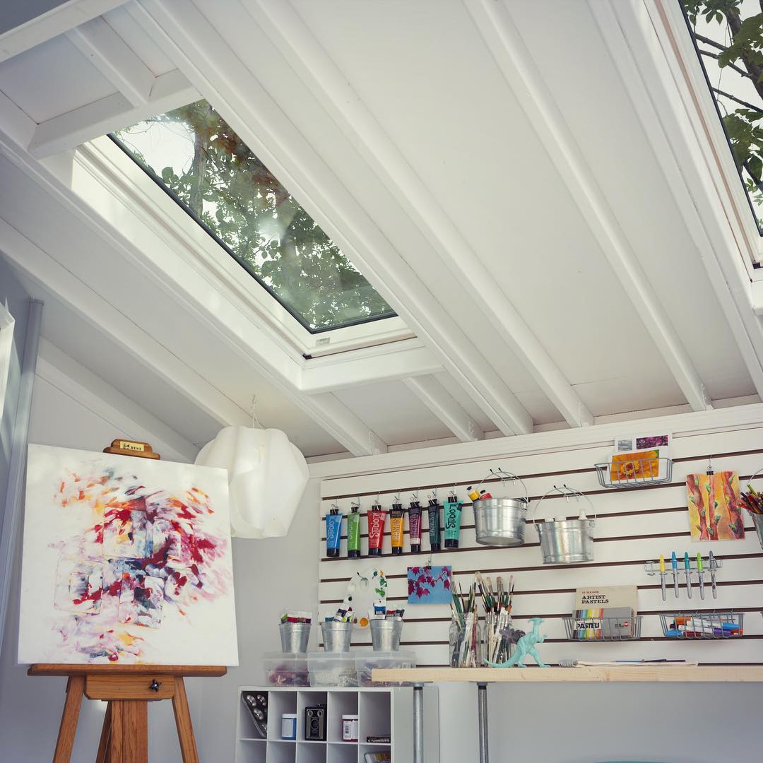 outdoor shed set up as an art studio with skylights photo by Instagram user @backyard.buildings