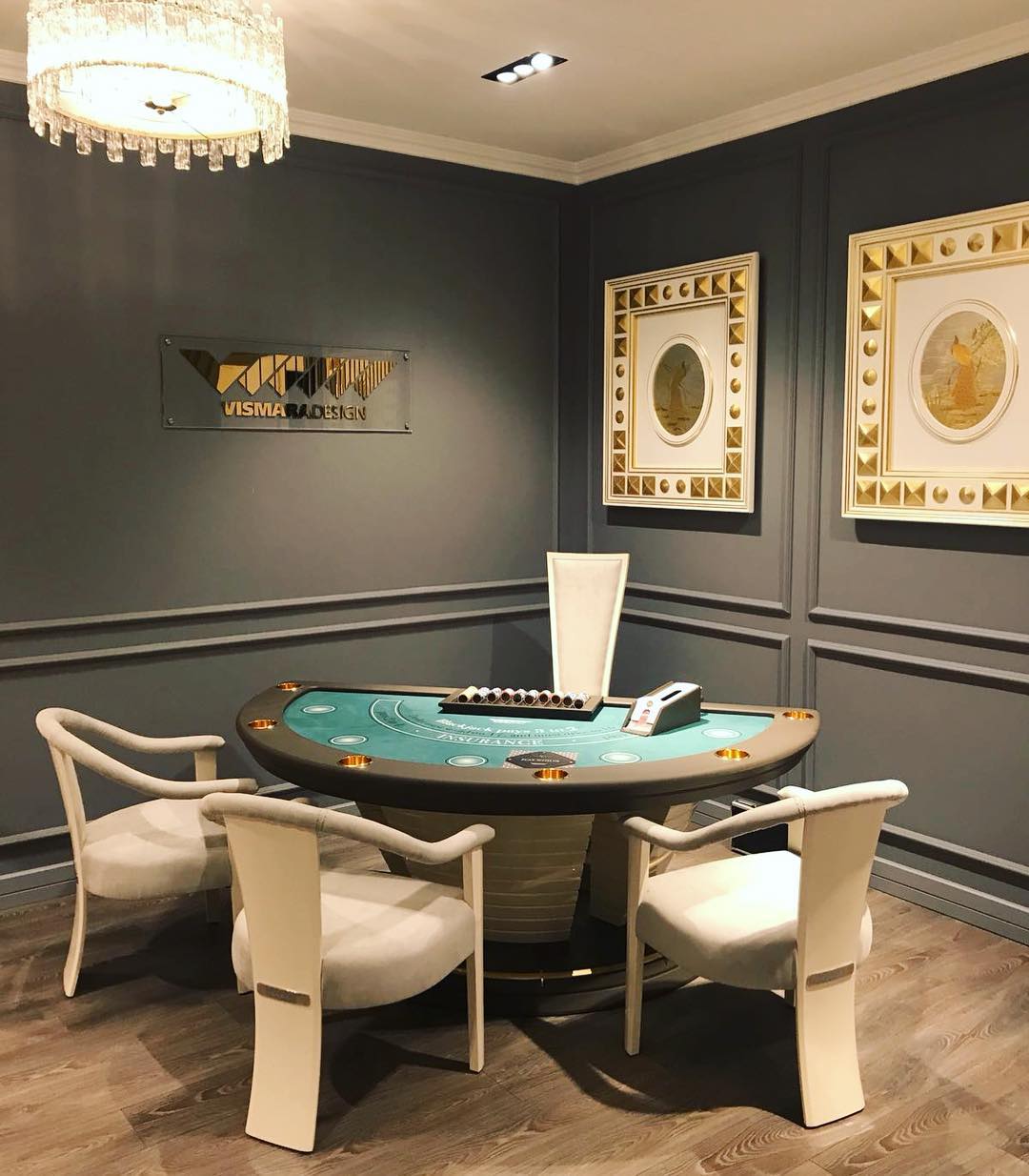 Poker table in grey game room. Photo by Instagram user @vismaradesignitaly