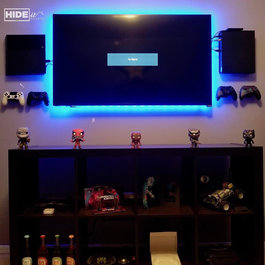 Wall mounted game systems. Photo by Instagram user @hideitmounts