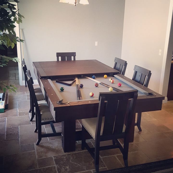 Wooden table with hidden pool table underneath. Photo by Instagram user @dkbilliards