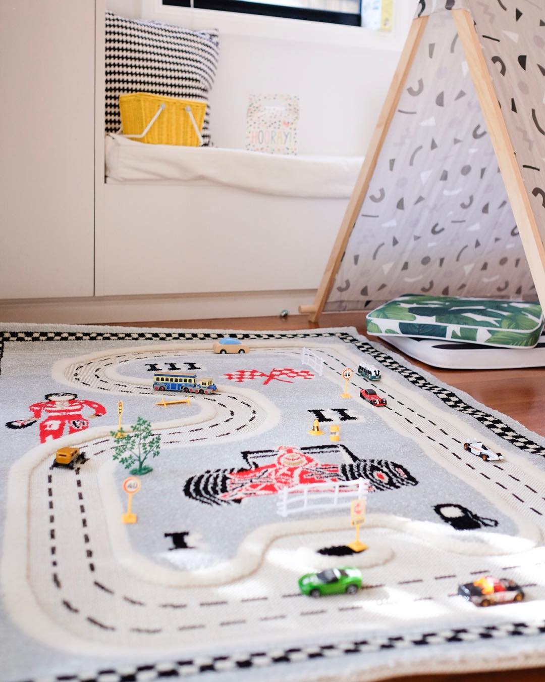 Kids rug with race tracks on it. Photo by Instagram user @urbanbabyshop