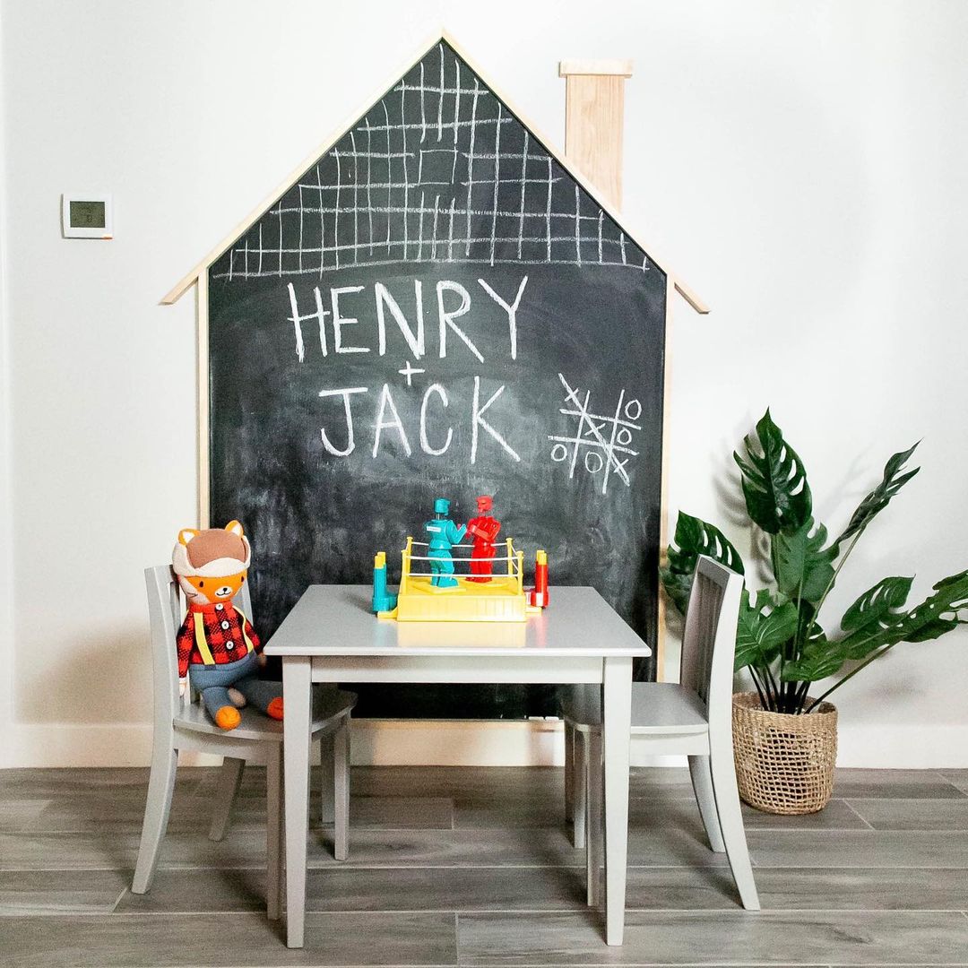 Small Chalkboard Painted Wall in a Kids Playroom. Photo by Instagram user @laceandgraceinteriors