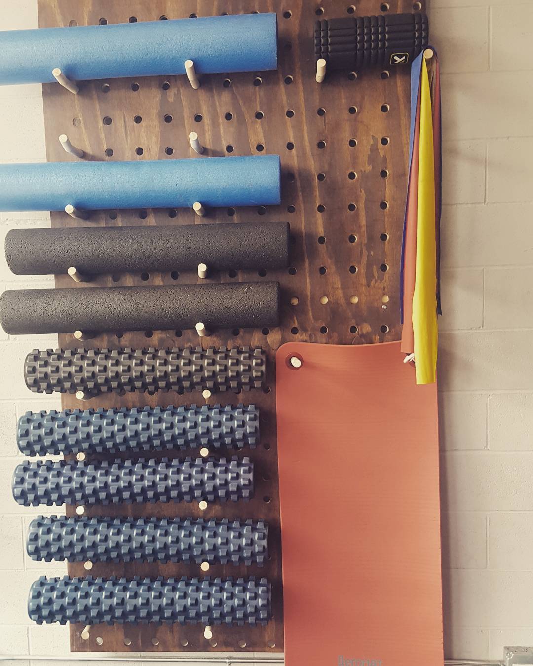 DIY pegboard for gym equipment. Photo by Instagram user @pptchicago
