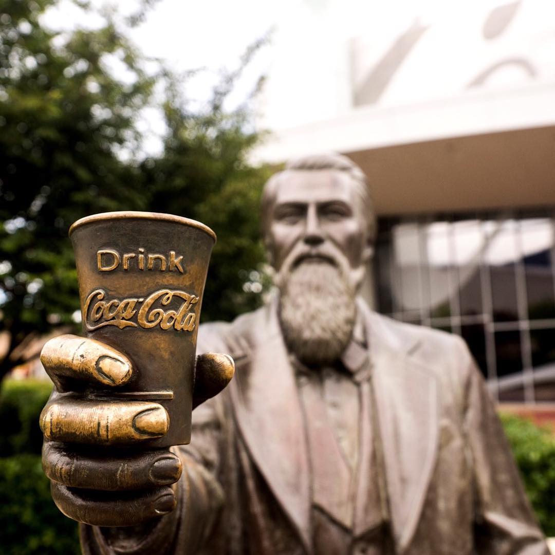 Statue of Dr. Pemberton in front of World of Coca-Cola. Photo by Instagram user @worldofcocacola