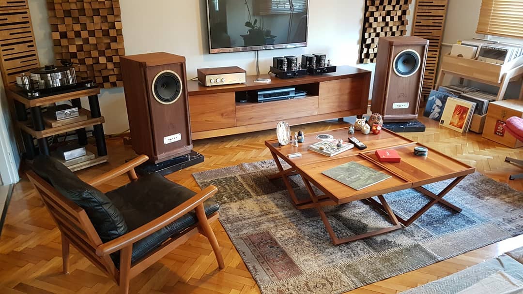 home stereo equipment in living room disguised to look like wooden furniture photo by Instagram user @v_for_vintage_1974
