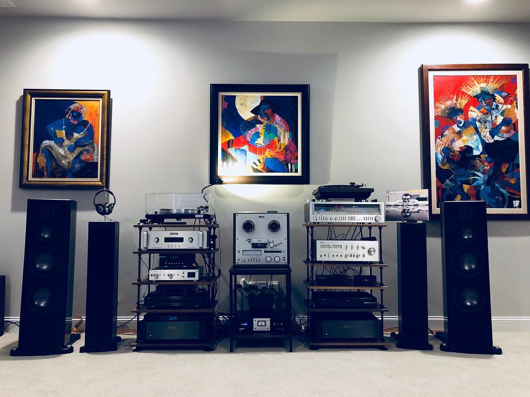 home stereo equipment sitting on top of sturdy shelves photo by Instagram user @ervinr