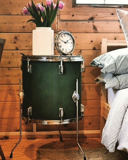 Floor tom drum repurposed as a night stand photo by Instagram user @johnburkemusic