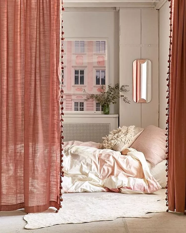 https://www.extraspace.com/blog/wp-content/uploads/2018/07/curtains-studio-apartment-ideas.jpg.webp