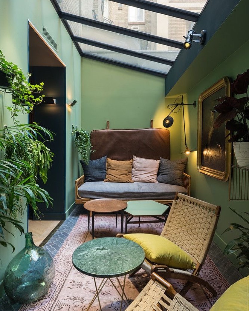small reading nook set up in small apartment alcove photo by Instagram user @small.spaces