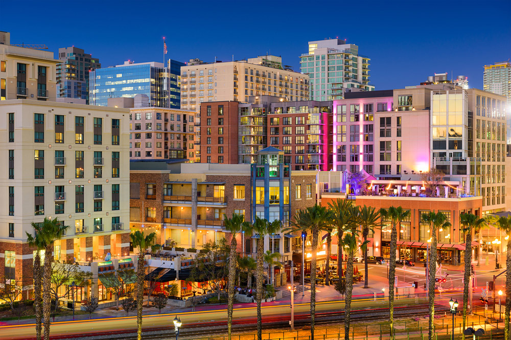 over looking downtown San Diego at night time with buildings and restaurants lit up