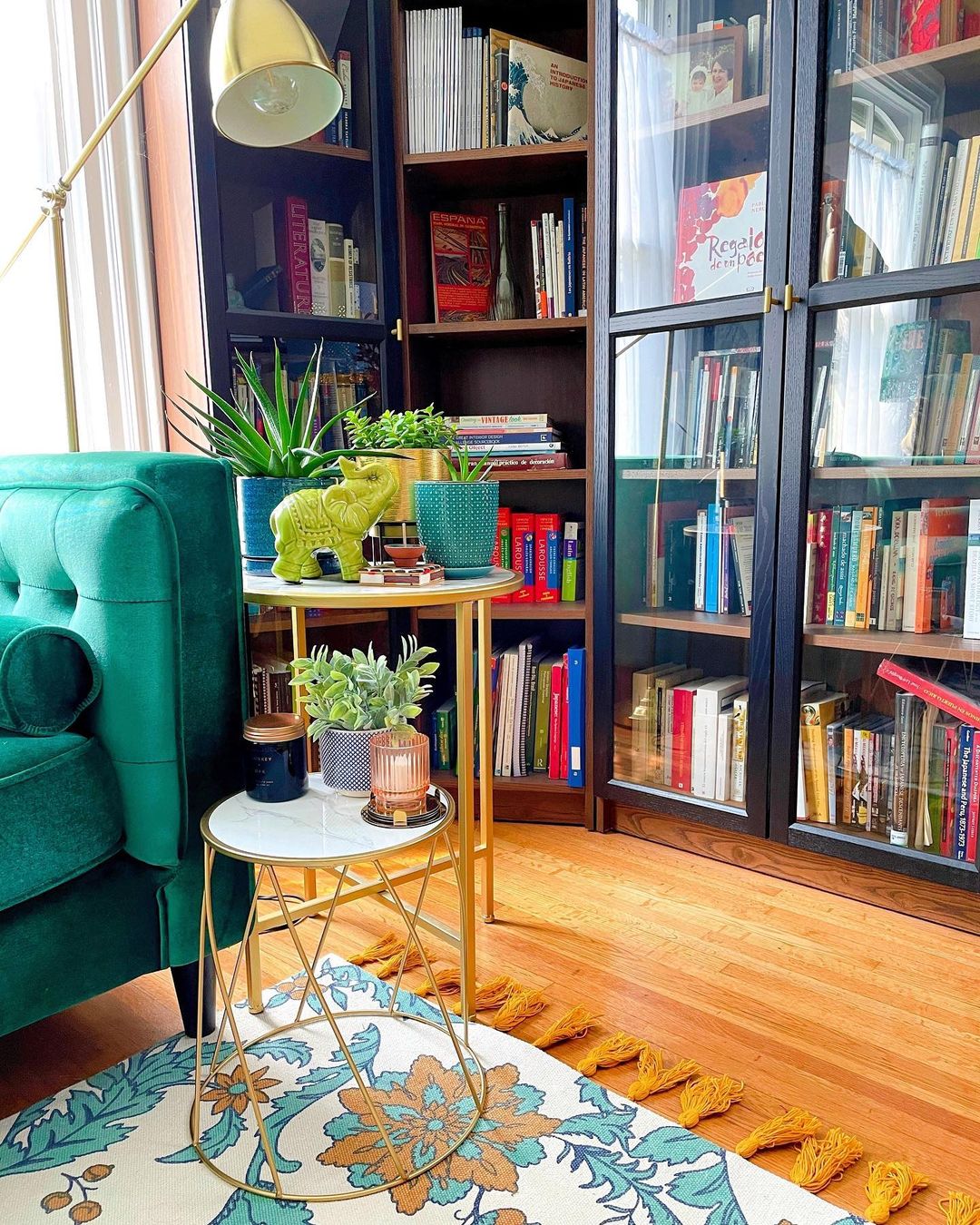 Nesting Tables Next to a Small Green Couch. Photo by Instagram user @ourmodernvictorianitalianate