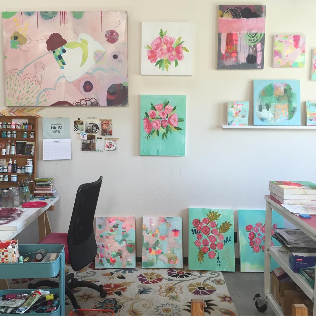 home office space with homemade art on the walls photo by Instagram user @matirose