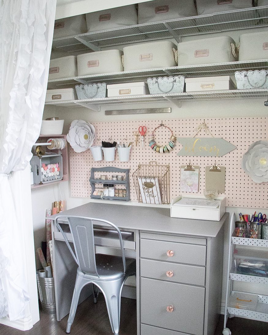 closet space used as a home office with peg board wall and storage overhead photo by Instagram user @prettyhealthyhouse