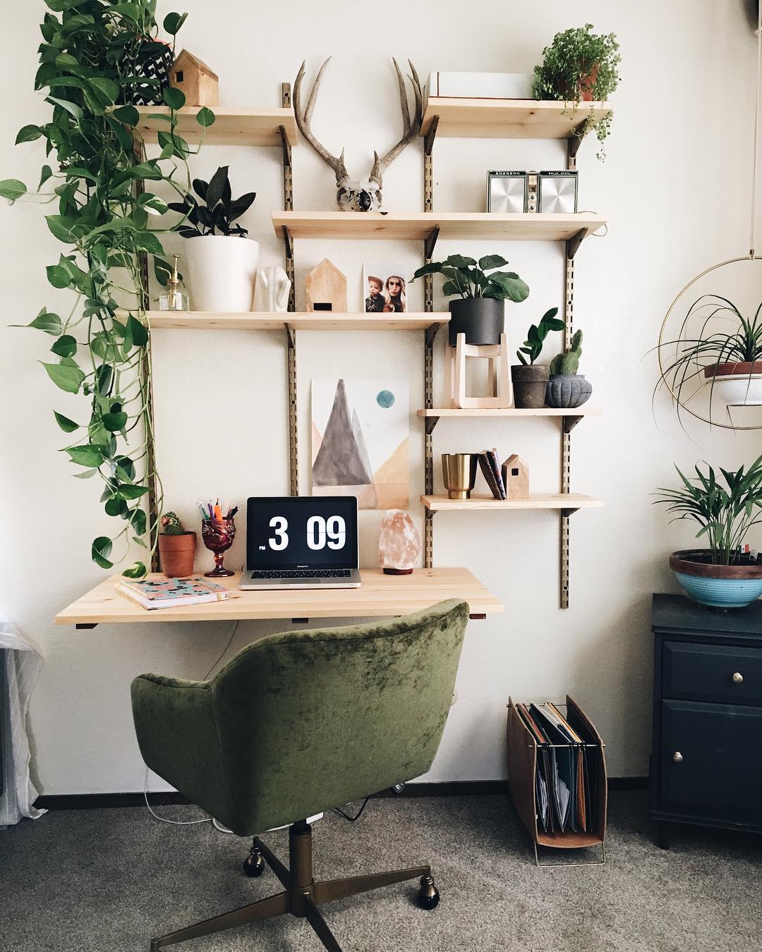 home office with a wall desk set up photo by Instagram user @milkandthistle_