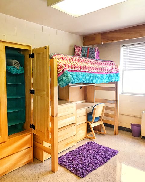 Lofted dorm bed above desk Photo via @tsu_reslife