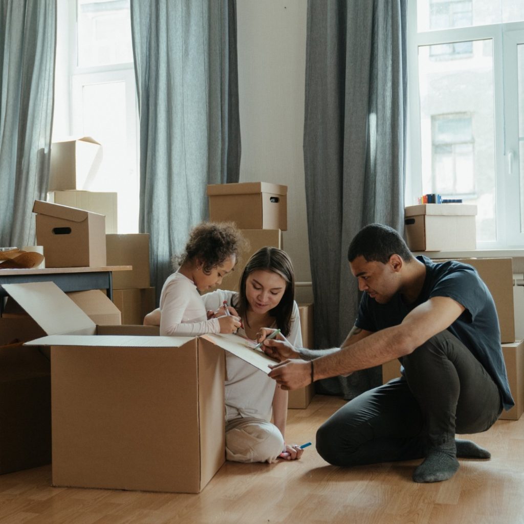 A family packing up a moving box. Photo by Instagram user @newjerseyhalloffame