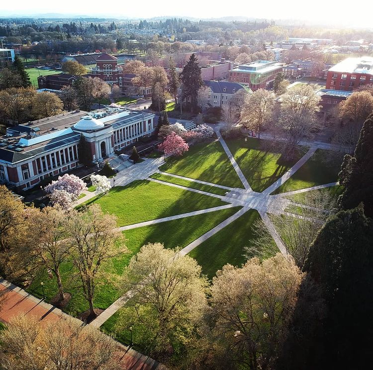 Sun peeking over the center of campus at Oregon State University. Photo by Instagram user @vahid_g