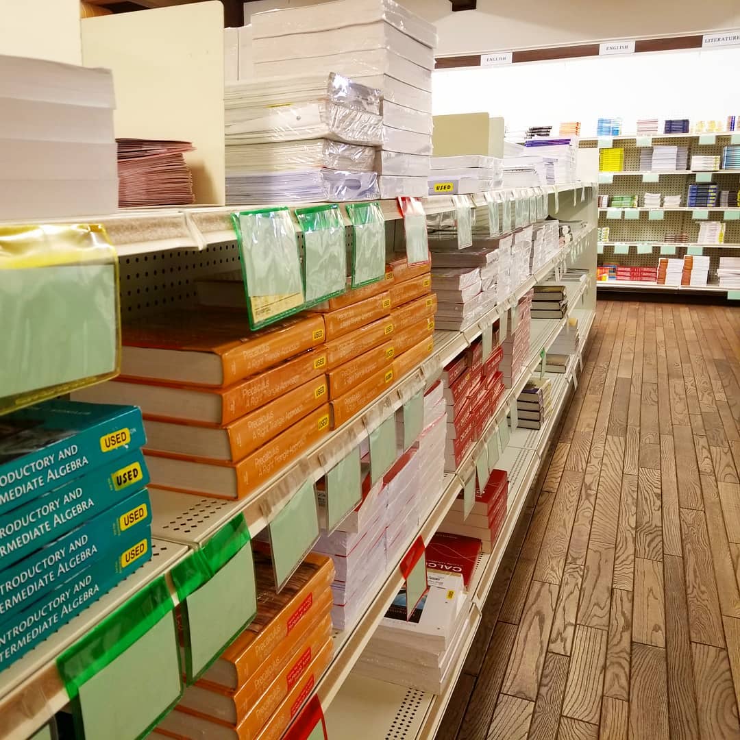 Stacks of Textbooks in a Campus Store. Photo by Instagram user @cbcollege