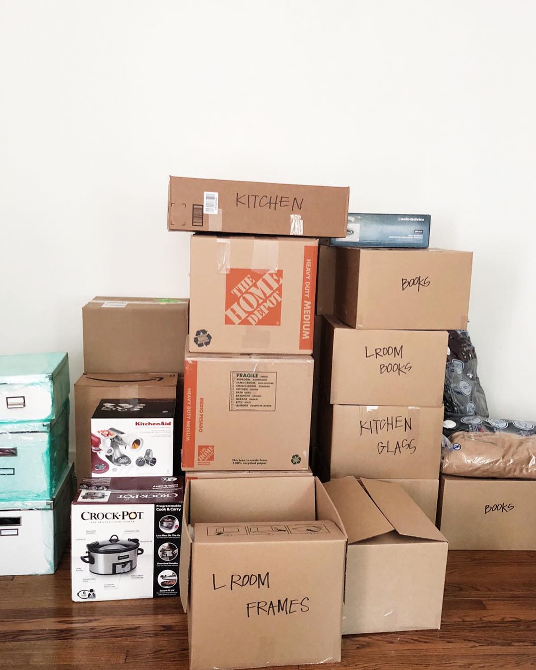 Moving Boxes Labeled for Specific Rooms. Photo by Instagram user @stephvilladavis