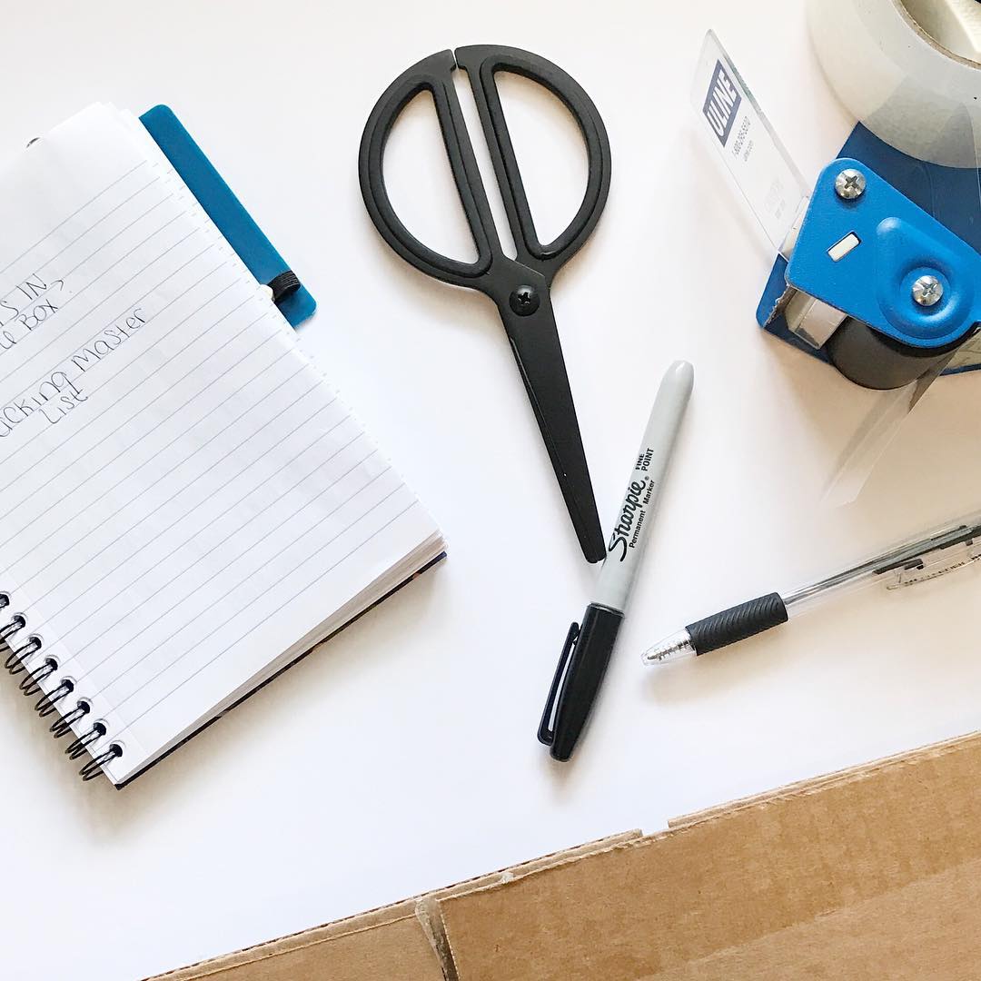 Pens, Scissors, Tape, and Other Packing Supplies. Photo by Instagram user @thesaraross