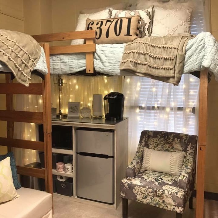 Lofted dorm room bed with mini kitchen underneath. Photo by Instagram user @get_emmypaiged