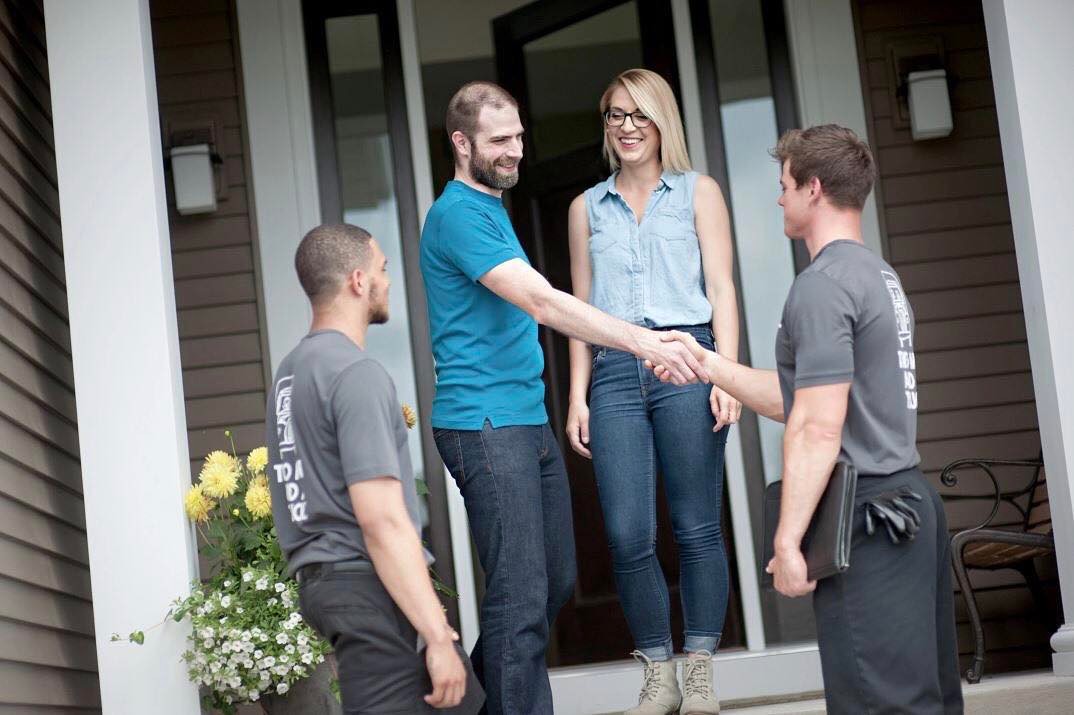 Customer Shaking Hands with Professional Movers. Photo by Instagram user @twomenandatruck