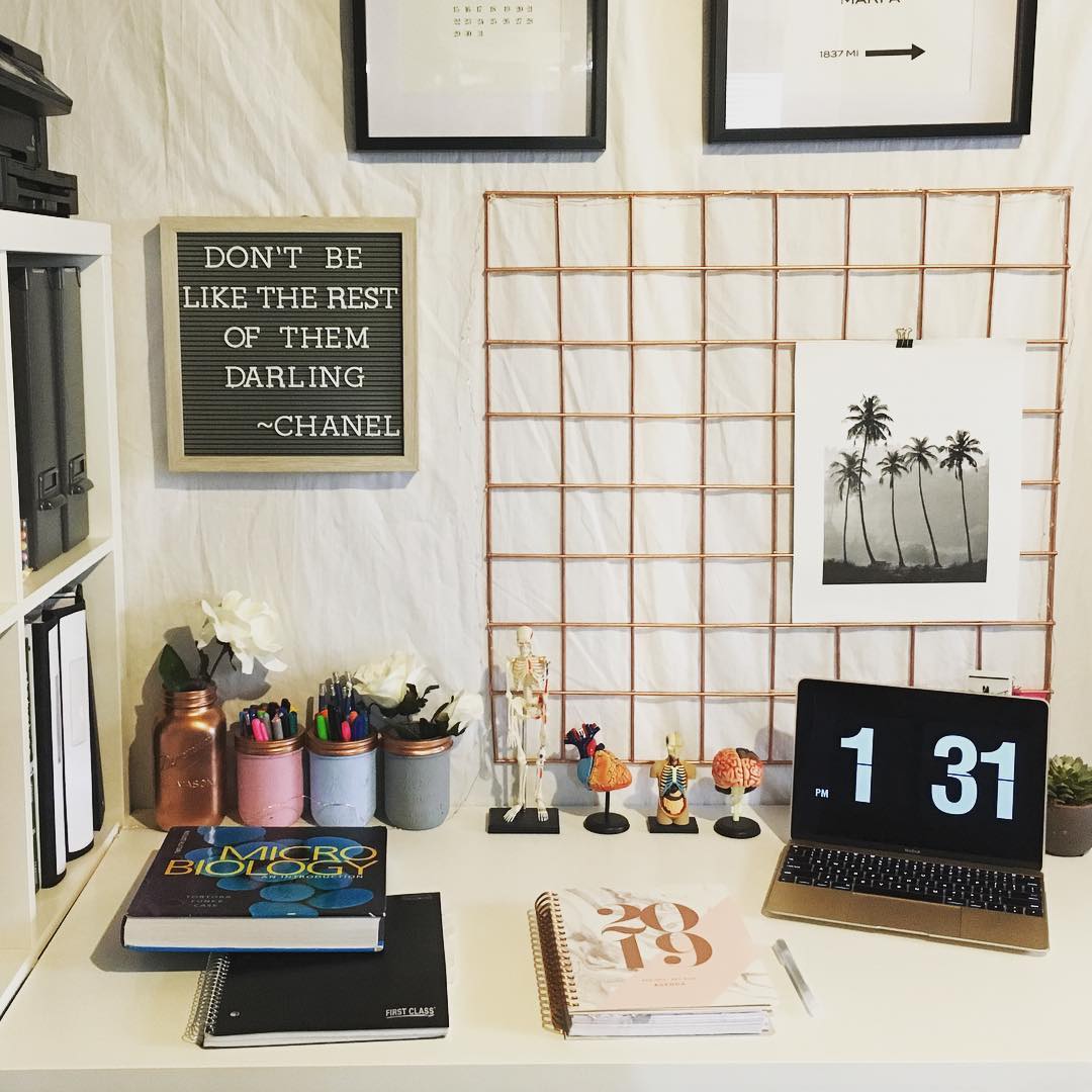 Dorm Room Desk with Laptop and Books. Photo by Instagram user @dayofanursingstudent