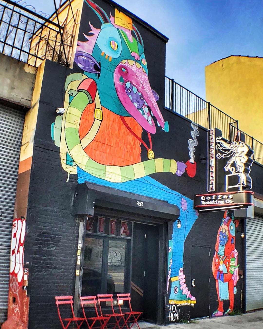 Colorful artwork on the side of a building Photo by Instagram user @walkinggirlnyc