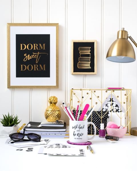 wall and desk decor with gold frames Photo via @digibuddha