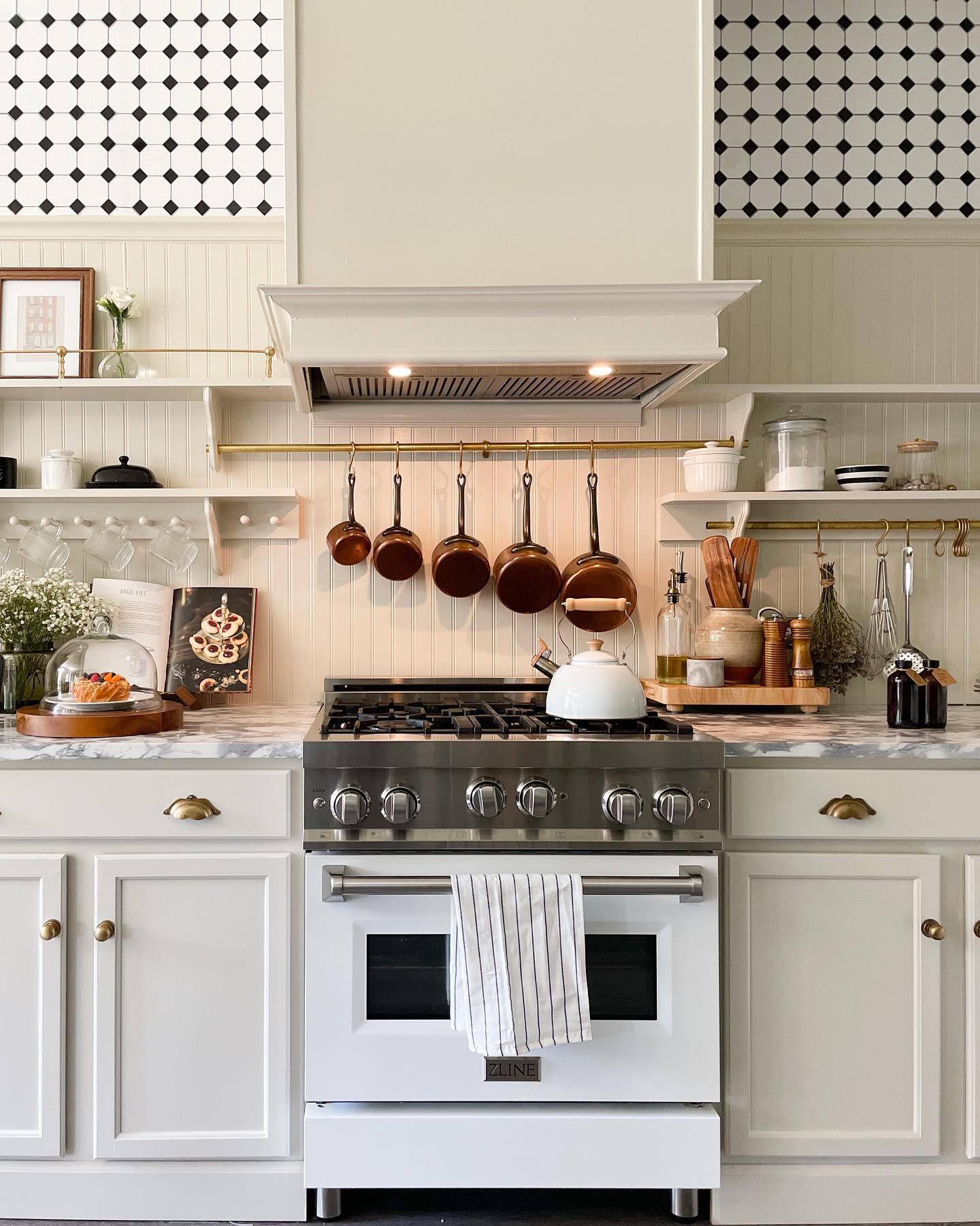 Kitchen shot of an oven with hanging storage.