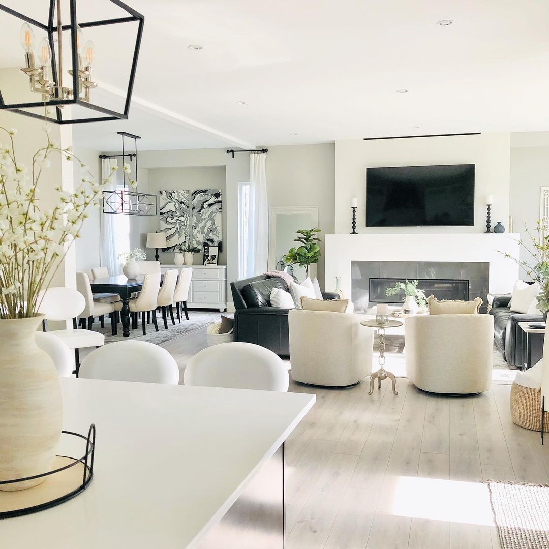 open floor plan with white colored furniture and walls. photo via @donnadelaine_home