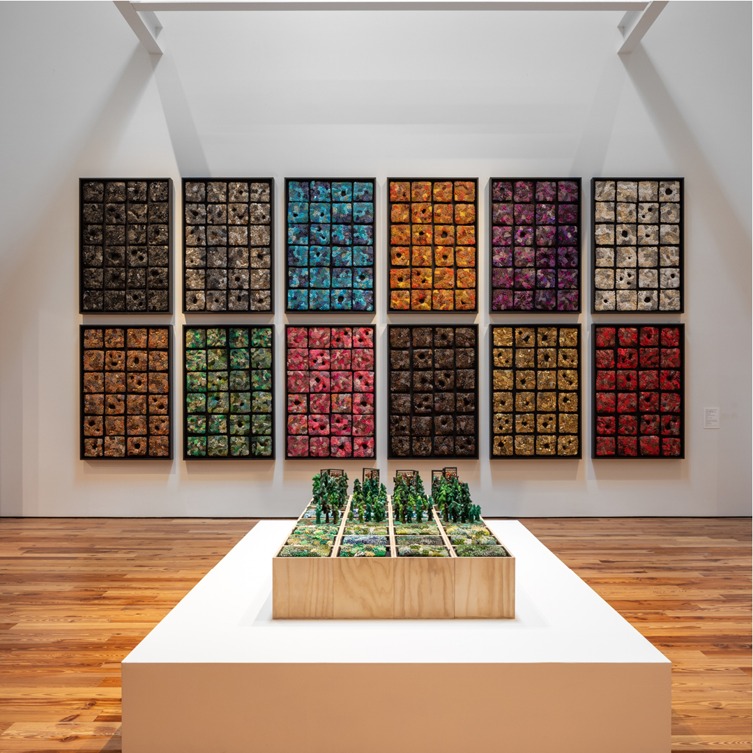 Temporary exhibition at Sarasota Art Museum called "Steven and William Ladd: Lead With a Laugh", featuring symmetrical cubes in different colors. Photo by Instagram user @sarasotaartmuseum.