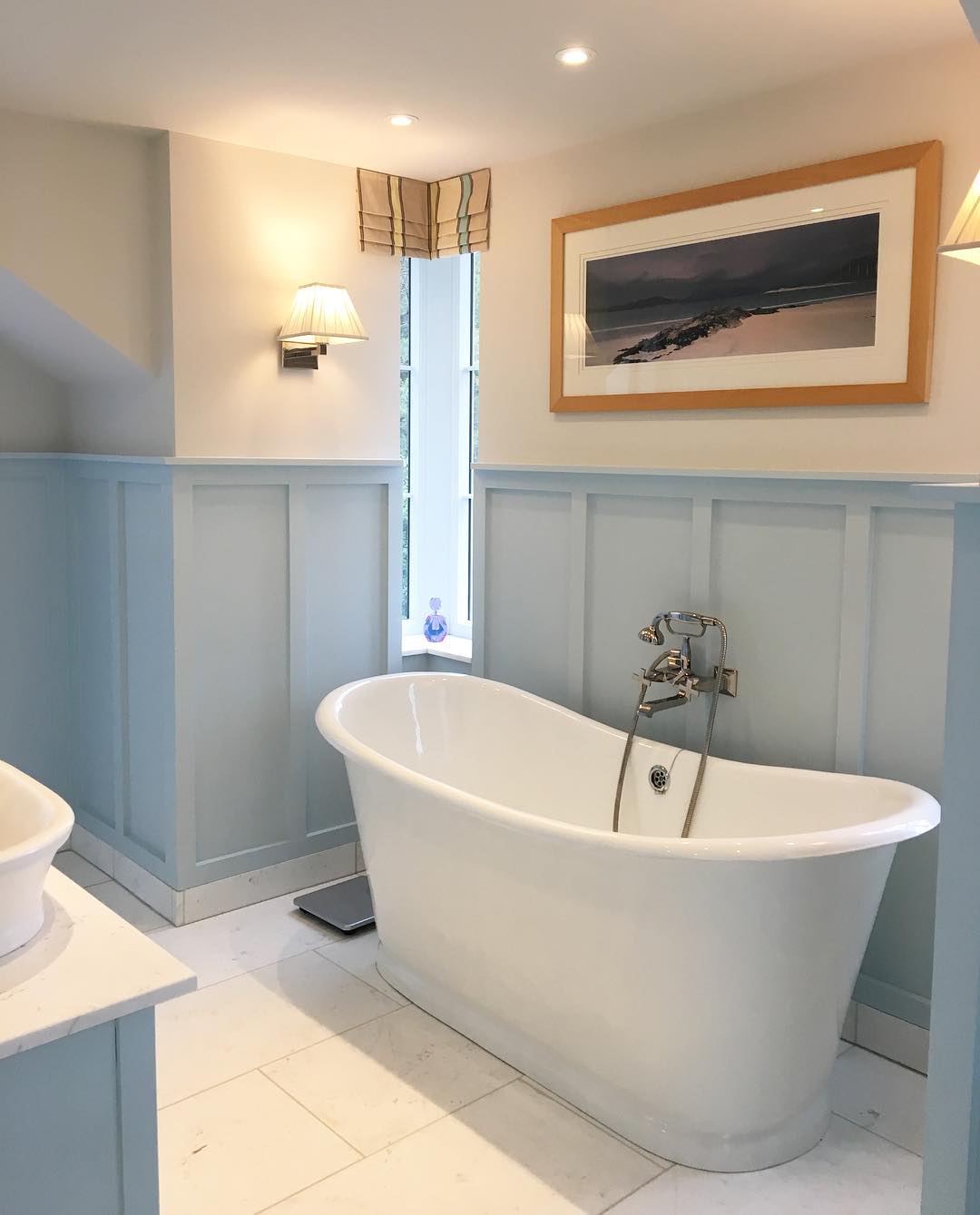 Bathroom with soaking tub. Photo by Instagram user @fineandcountrylakedistrict