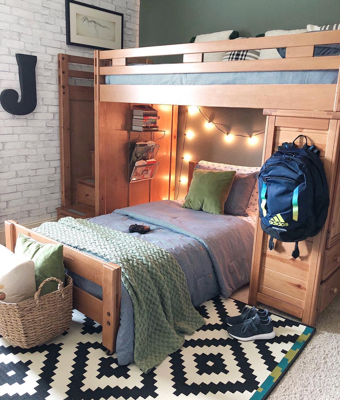 Bedroom with bunk beds and fun zig-zag carpet.