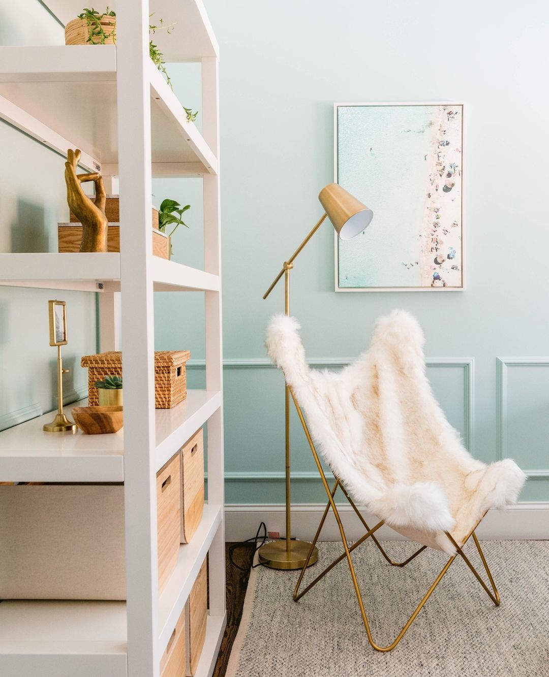 Teen bedroom with light blue walls.