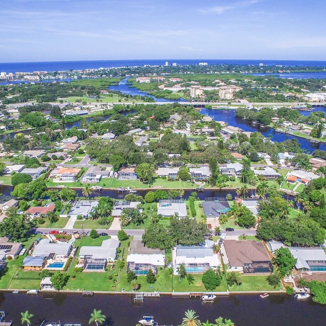 Overhead view of neighborhood in Sarasota with waterways Photo by Instagram user @buyorsellsarasota