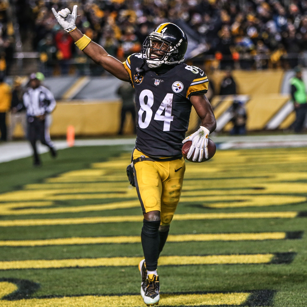 Football player Antonio Brown stands tall and smiles after a touchdown. Photo by Instagram user @steelers