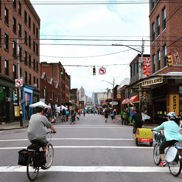 Bicyclist ride through Strip District to local shops. Photo by Instagram user @davecooperclaire