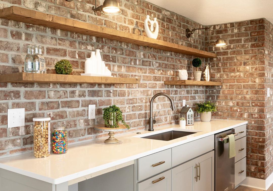 Basement Bar with Floating Shelves Installed. Photo by Instagram user @annajoyinteriors