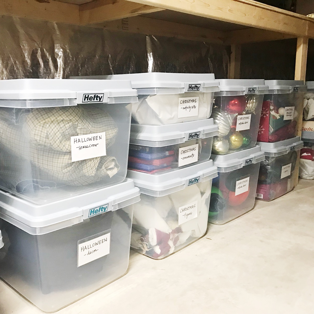 Plastic Totes with White Labels on Them. Photo by Instagram user @systemsbysusie