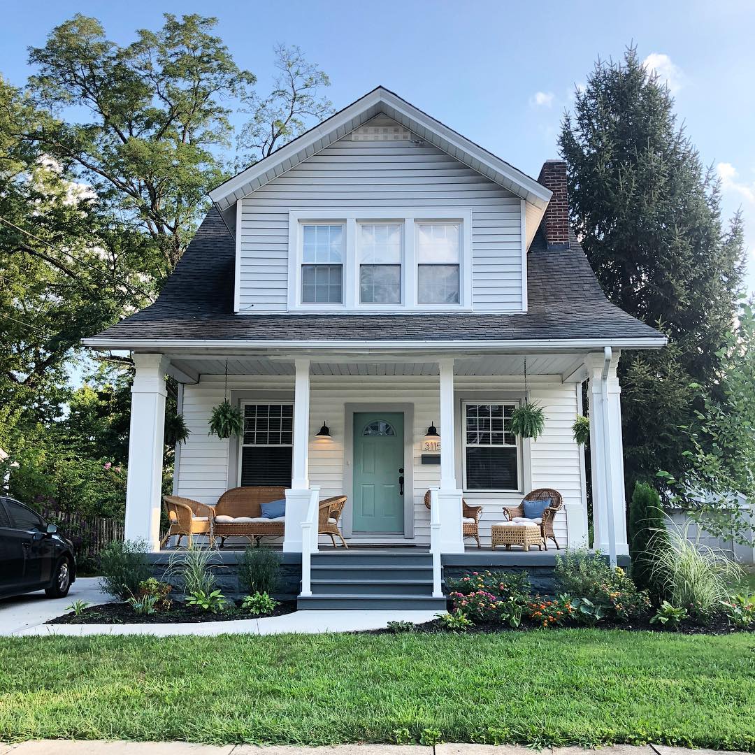 Beautiful white 2 story home with front porch. Photo by Instagram user @erinpfay