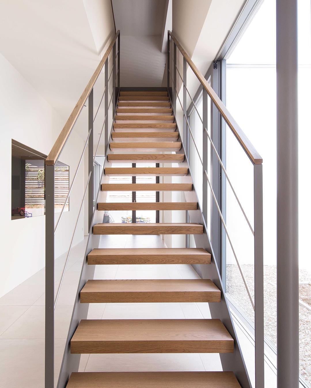 Modern staircase in minimalist home design. Photo by Instagram user @admonteraustralia