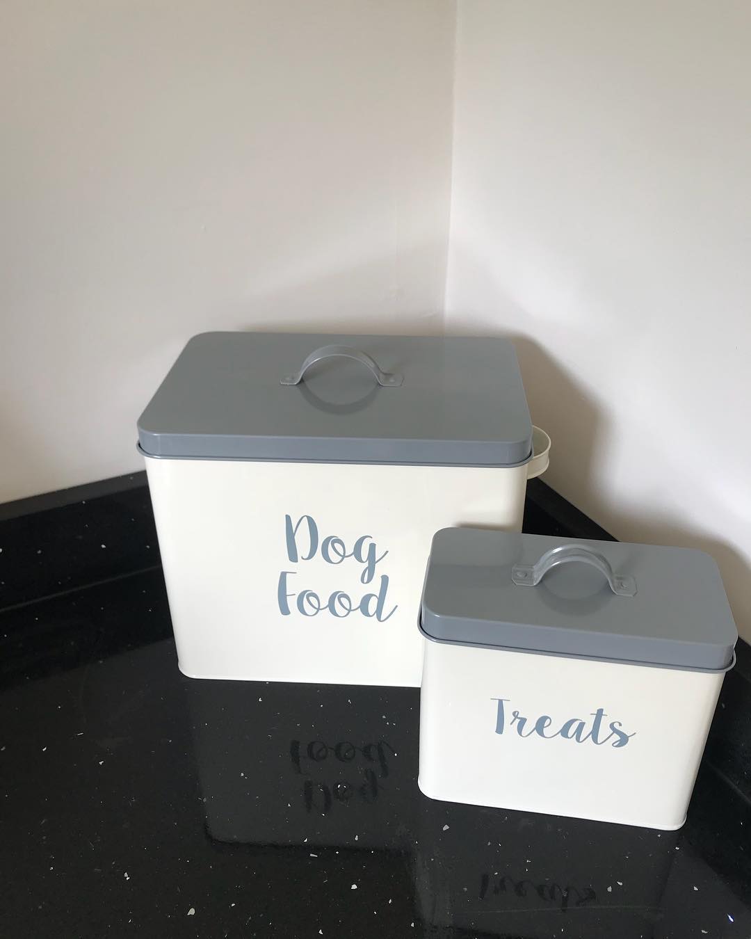 Plastic Boxes Labeled for Dog Food and Treats. Photo by Instagram user @ourhomewithcharlie