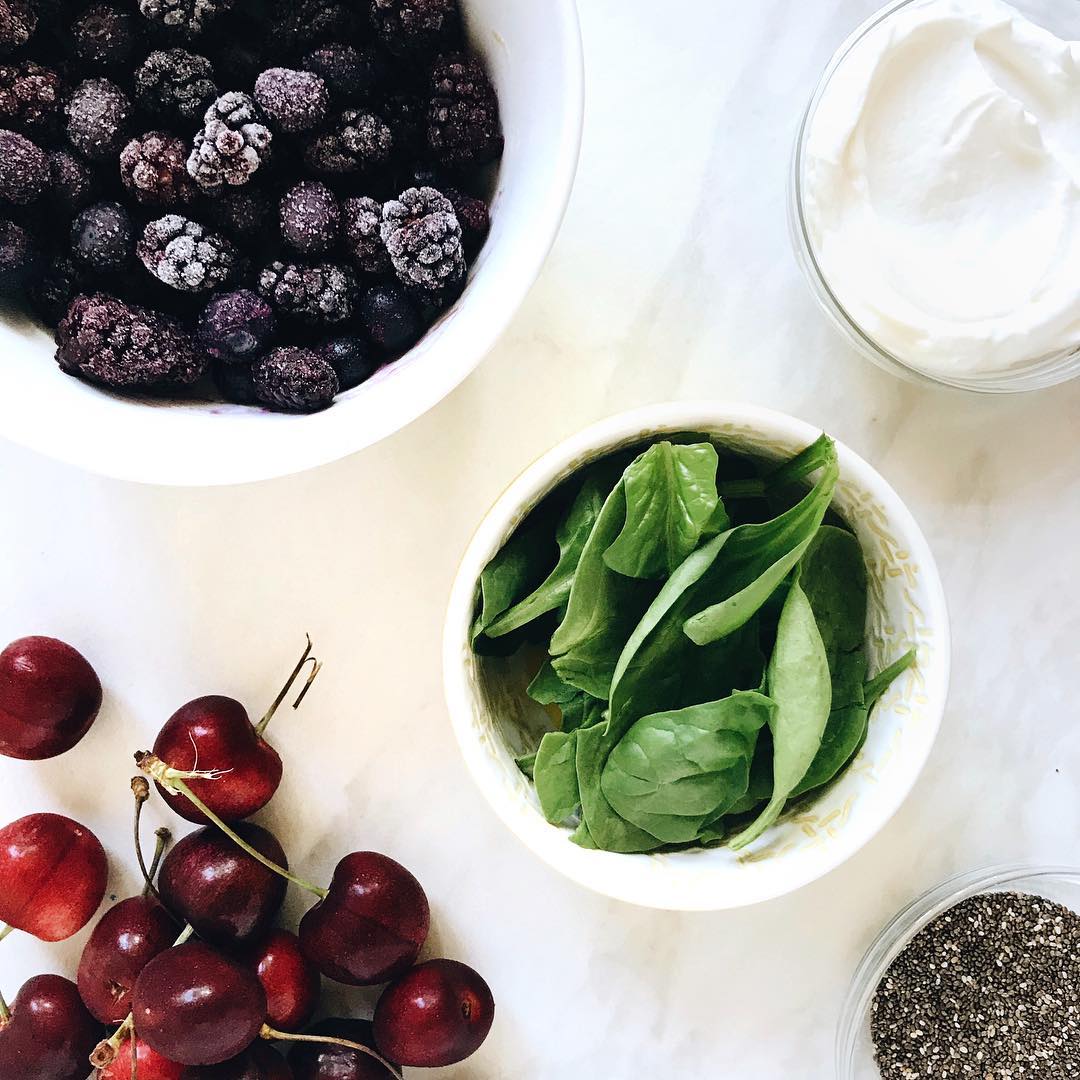 Fruit smoothie ingredients on white background. Photo by Instagram user @midweekminimalist