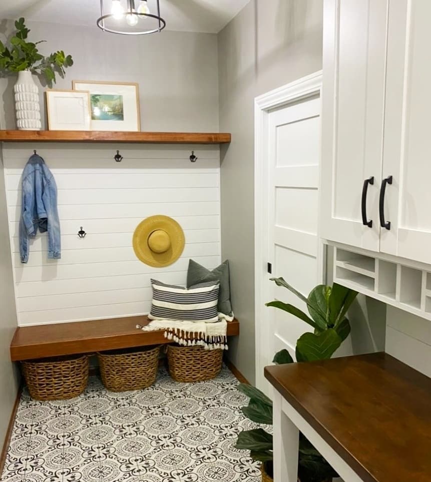 Mudroom with floating shelves. Photo by Instagram user @n.c.design316