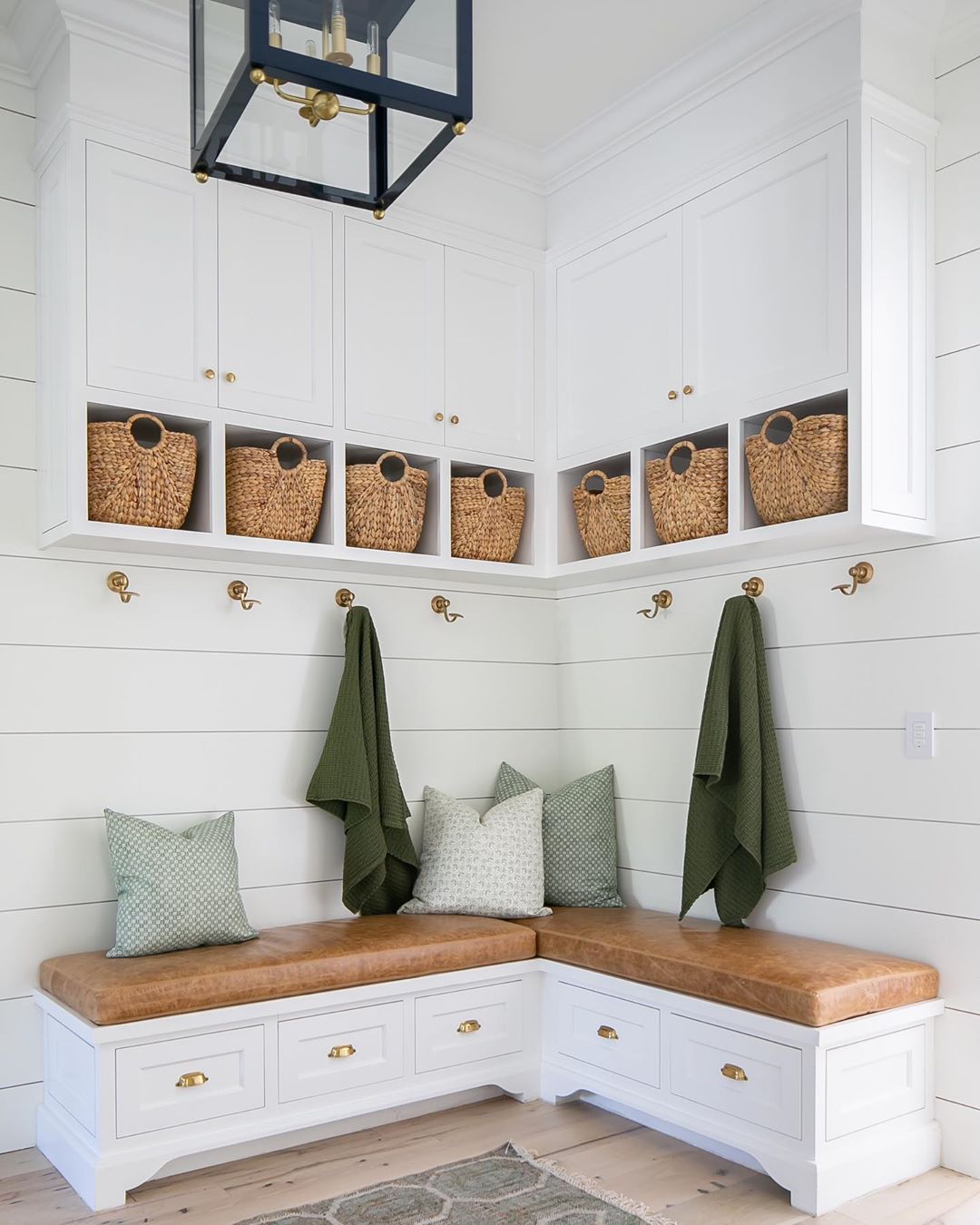 Storage bench in mudroom. Photo by Instagram user @brookewagnerdesign