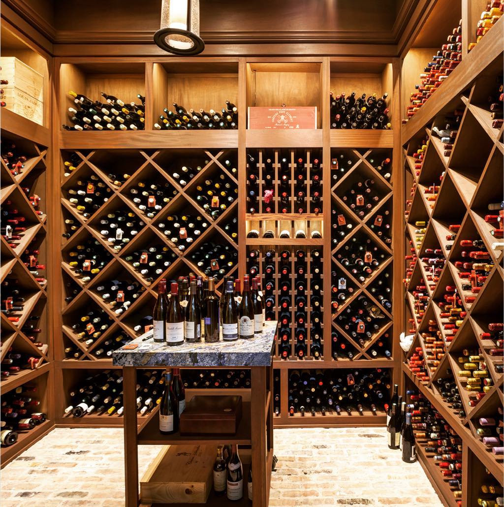 Expansive Wine Cellar in Home Basement. Photo by Instagram user @winfreydesignbuild
