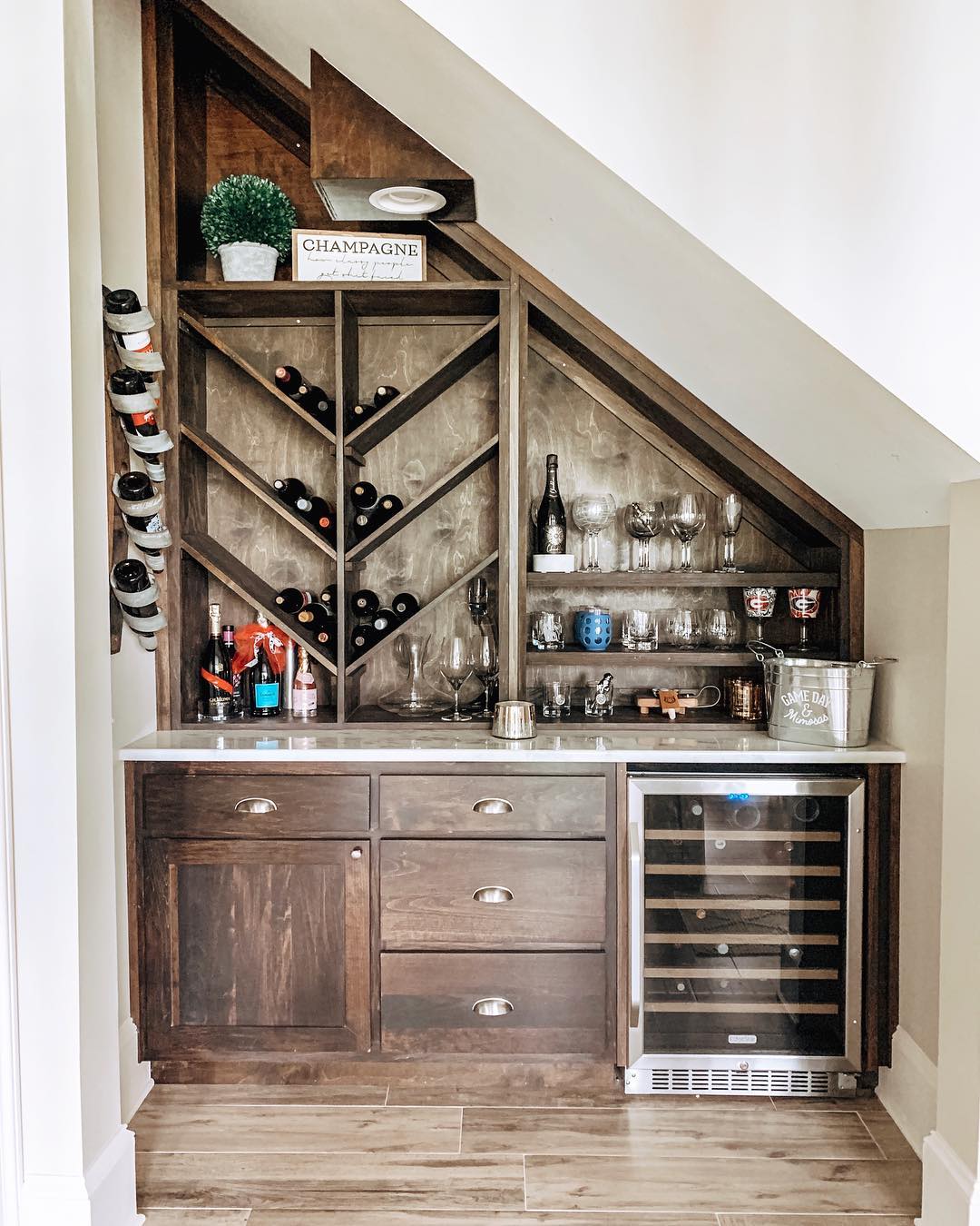 Brown Wine Rack in White Room. Photo by Instagram user @meggoelz