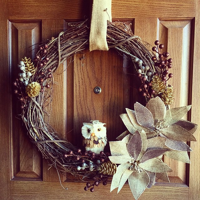 Homemade Wreath Made out of Sticks Hanging on Front Door. Photo by Instagram user @momendeavors
